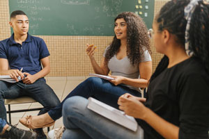 Three students talking